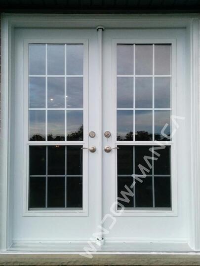 double french doors in white full venting glass with grilles